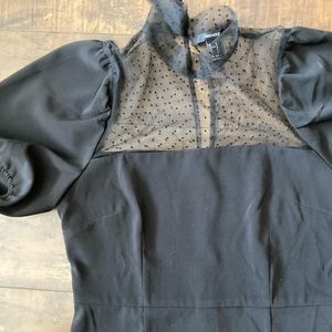 Black polka dot sheer neck with cut out back dress